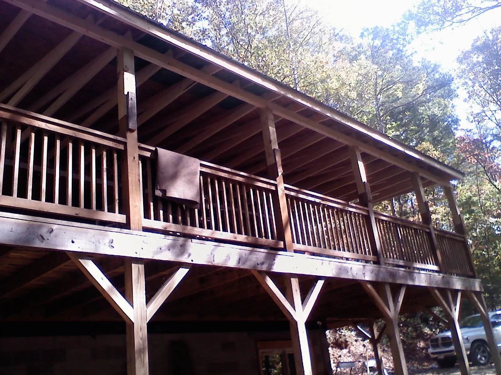 Timber framing under a new elevated porch and deck — Roof Leak Repair in Clyman by Roofing Brothers